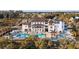 Aerial view of the backyard featuring a luxurious pool, bar, and meticulous landscaping at 4121 Golf Cottage Ln, Johns Island, SC 29455