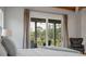 This bedroom features a view of the golf course at 4121 Golf Cottage Ln, Johns Island, SC 29455