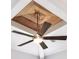 Unique ceiling fan with a decorative wood ceiling at 4121 Golf Cottage Ln, Johns Island, SC 29455