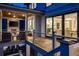 Relaxing covered deck featuring an outdoor television and comfortable seating at 4121 Golf Cottage Ln, Johns Island, SC 29455