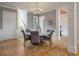 Formal dining room with hardwood floors, decorative chandelier, and wainscoting at 4121 Golf Cottage Ln, Johns Island, SC 29455