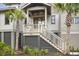 Charming front entrance with well-maintained stairs, landscaping, and clearly visible house number at 4121 Golf Cottage Ln, Johns Island, SC 29455