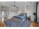 Main bedroom featuring tray ceilings, neutral walls, and views of the surrounding scenery at 4121 Golf Cottage Ln, Johns Island, SC 29455