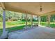 Covered back patio offering an outdoor space with views of the lush, green backyard at 441 Compton Dr, Moncks Corner, SC 29461