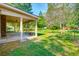 Spacious backyard with a covered patio and plenty of space for outdoor activities at 441 Compton Dr, Moncks Corner, SC 29461