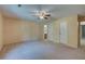 Bright bedroom featuring neutral walls, carpet flooring, and ensuite bathroom access at 441 Compton Dr, Moncks Corner, SC 29461