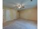 Bedroom with neutral walls, carpet flooring, a ceiling fan and multiple closets at 441 Compton Dr, Moncks Corner, SC 29461
