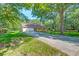 A home with a driveway and manicured lawn at 441 Compton Dr, Moncks Corner, SC 29461