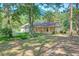 Traditional home on a sprawling lot, with mature trees and established lawn at 441 Compton Dr, Moncks Corner, SC 29461