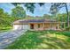 Charming home with a two-car garage and covered porch, perfect for relaxing outdoors at 441 Compton Dr, Moncks Corner, SC 29461