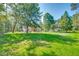 Beautifully landscaped property with a charming home and mature trees at 441 Compton Dr, Moncks Corner, SC 29461
