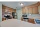 Functional kitchen featuring wood cabinetry, stainless steel appliances, and a breakfast bar at 441 Compton Dr, Moncks Corner, SC 29461