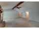 Spacious living room featuring a fireplace, fan, and neutral colors at 441 Compton Dr, Moncks Corner, SC 29461