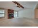 Bright living room with a brick fireplace, vaulted ceiling and abundant natural light at 441 Compton Dr, Moncks Corner, SC 29461