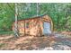 Wood outbuilding with garage door, small window, and a convenient ramp at 441 Compton Dr, Moncks Corner, SC 29461