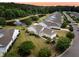 Beautiful aerial view of home overlooking a pond with fountains in a well manicured community at 528 Sea Foam St, Summerville, SC 29486