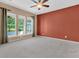 Large bedroom featuring carpeted floors, ample natural light, and ceiling fan at 528 Sea Foam St, Summerville, SC 29486