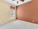 Comfortable bedroom with natural light from a sunny window and neutral carpet at 528 Sea Foam St, Summerville, SC 29486