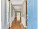 Inviting entryway boasting hardwood floors and trim detail; the light blue entry door is a stand out feature at 528 Sea Foam St, Summerville, SC 29486