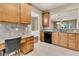 Kitchen with desk area, and view to a living space with lots of natural light at 528 Sea Foam St, Summerville, SC 29486