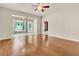 Bright living room featuring hardwood floors, natural light, and backyard views at 528 Sea Foam St, Summerville, SC 29486