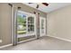 Cozy sunroom with tiled floors, backyard access, and relaxing fountain views at 528 Sea Foam St, Summerville, SC 29486