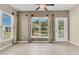 Bright sunroom offering tiled floors, backyard access, and tranquil views at 528 Sea Foam St, Summerville, SC 29486