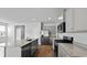 Open kitchen featuring stainless steel appliances, granite countertops and gray cabinets at 807 Long Bluff Rd, Summerville, SC 29486
