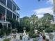 Backyard patio surrounded by lush landscaping and tranquil outdoor living space at 81 Rutledge Ave, Charleston, SC 29401