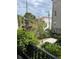 Charming balcony with decorative ironwork and view of a quaint street and nearby buildings at 81 Rutledge Ave, Charleston, SC 29401