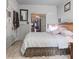Inviting bedroom with comfortable bed, classic decor, and soft lighting at 81 Rutledge Ave, Charleston, SC 29401