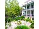 Beautiful garden with lush plants and greenery offering a serene outdoor retreat and architectural views at 81 Rutledge Ave, Charleston, SC 29401