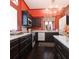 Charming kitchen with a view, with dark cabinets and ample counter space at 81 Rutledge Ave, Charleston, SC 29401