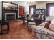 Spacious living room featuring a fireplace, tile floors and large windows at 81 Rutledge Ave, Charleston, SC 29401