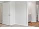 Hallway featuring fresh paint and modern paneled doors at 810 Long Bluff Rd, Summerville, SC 29486
