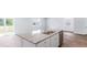 Open-concept kitchen featuring granite counters, stainless dishwasher and a center island with a sink at 810 Long Bluff Rd, Summerville, SC 29486