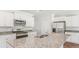 Elegant kitchen with granite countertops, stainless steel appliances, and a large island at 810 Long Bluff Rd, Summerville, SC 29486