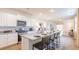 Modern kitchen with white cabinets, granite countertops, stainless steel appliances, and a breakfast bar at 812 Long Bluff Rd, Summerville, SC 29486