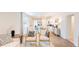 Open-concept living space with modern decor, seamlessly connecting living and dining areas at 812 Long Bluff Rd, Summerville, SC 29486