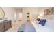 Serene main bedroom featuring soft neutral tones, a large window, and comfortable furnishings at 812 Long Bluff Rd, Summerville, SC 29486