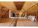 Unfinished attic with spray foam insulation, exposed beams, and a large open space for storage or renovation at 820 Old Cordesville Rd, Moncks Corner, SC 29461