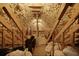 Large unfinished attic space with exposed rafters and storage bags that offers many possibilities at 820 Old Cordesville Rd, Moncks Corner, SC 29461