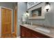 Bathroom featuring double sinks, granite countertops, and modern lighting fixtures at 820 Old Cordesville Rd, Moncks Corner, SC 29461