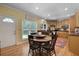 Breakfast nook featuring natural light, charming wooden table and a view to the kitchen at 820 Old Cordesville Rd, Moncks Corner, SC 29461