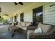 Inviting front porch with comfortable seating and a serene outdoor ambiance at 820 Old Cordesville Rd, Moncks Corner, SC 29461