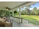 Comfortable front porch with wicker seating and ceiling fans for added comfort at 820 Old Cordesville Rd, Moncks Corner, SC 29461