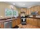Well-equipped kitchen with stainless steel appliances and wood countertops at 820 Old Cordesville Rd, Moncks Corner, SC 29461