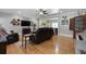 Spacious living room featuring hardwood floors, TV, and comfortable furniture at 820 Old Cordesville Rd, Moncks Corner, SC 29461