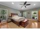 Inviting primary bedroom featuring a comfortable bed, wood floors, and great natural light at 820 Old Cordesville Rd, Moncks Corner, SC 29461