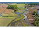 Stunning aerial view of the river and lush landscape surrounding the property at 840 Forrest Dr, Charleston, SC 29492